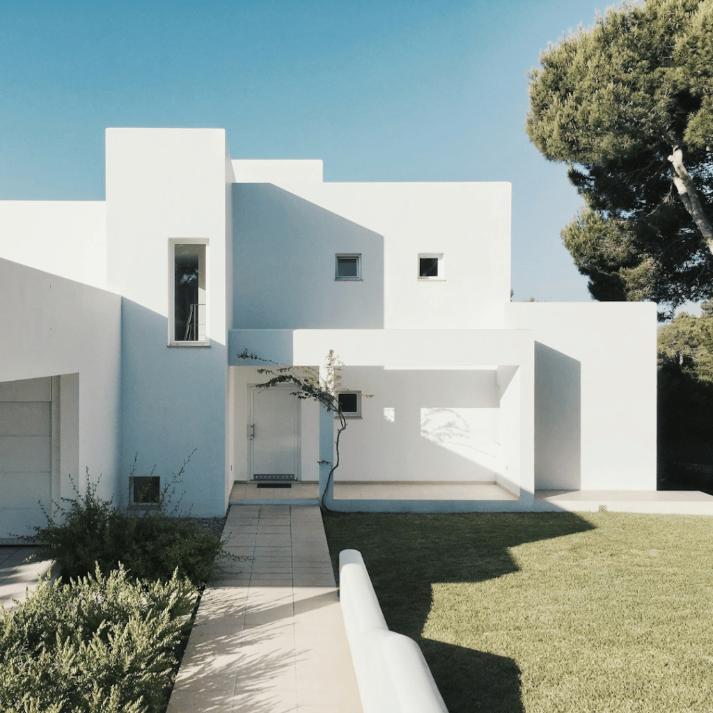 9 Essential Documents When Buying Property Abroad 2 A stack of organized documents symbolizing the essential paperwork needed for buying property abroad, including a passport, property survey, and title deeds.