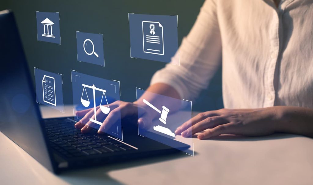The Digital Revolution of Notary Services: How NotaryPublic24.com is Leading the Way in 2025 7 Person using laptop with virtual legal icons representing digital notary services and online document authentication in 2025 by NotaryPublic24.com.